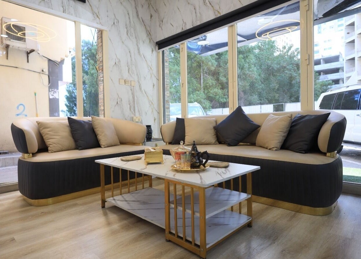 Luxurious lounge area at Leaders Palace Gents Care Facility, Sharjah, Sharjah, AE with plush sofas and decor.