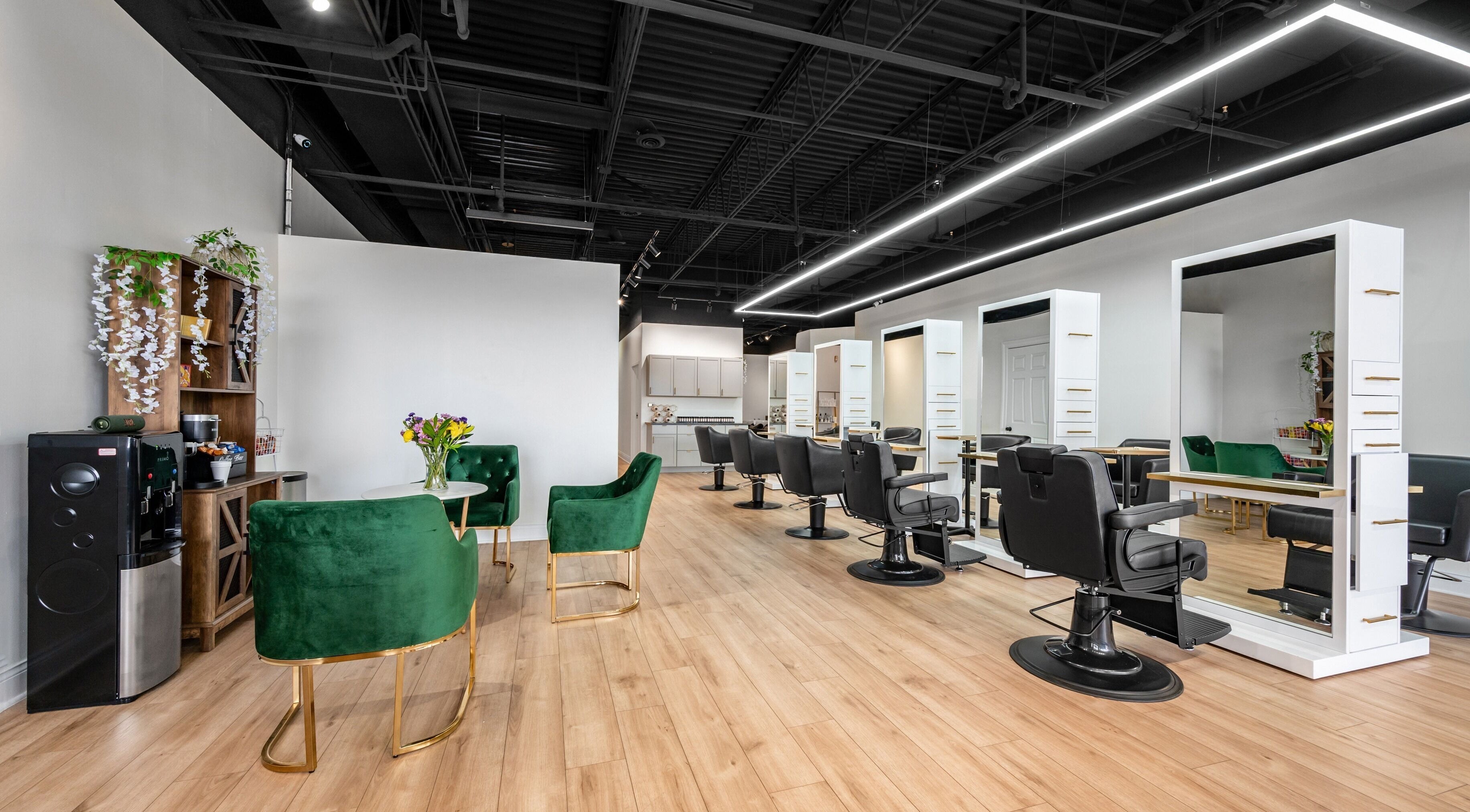 Chic interior of Artisan Theory Salon, Villa Park, Illinois, US featuring stylish chairs and modern decor.