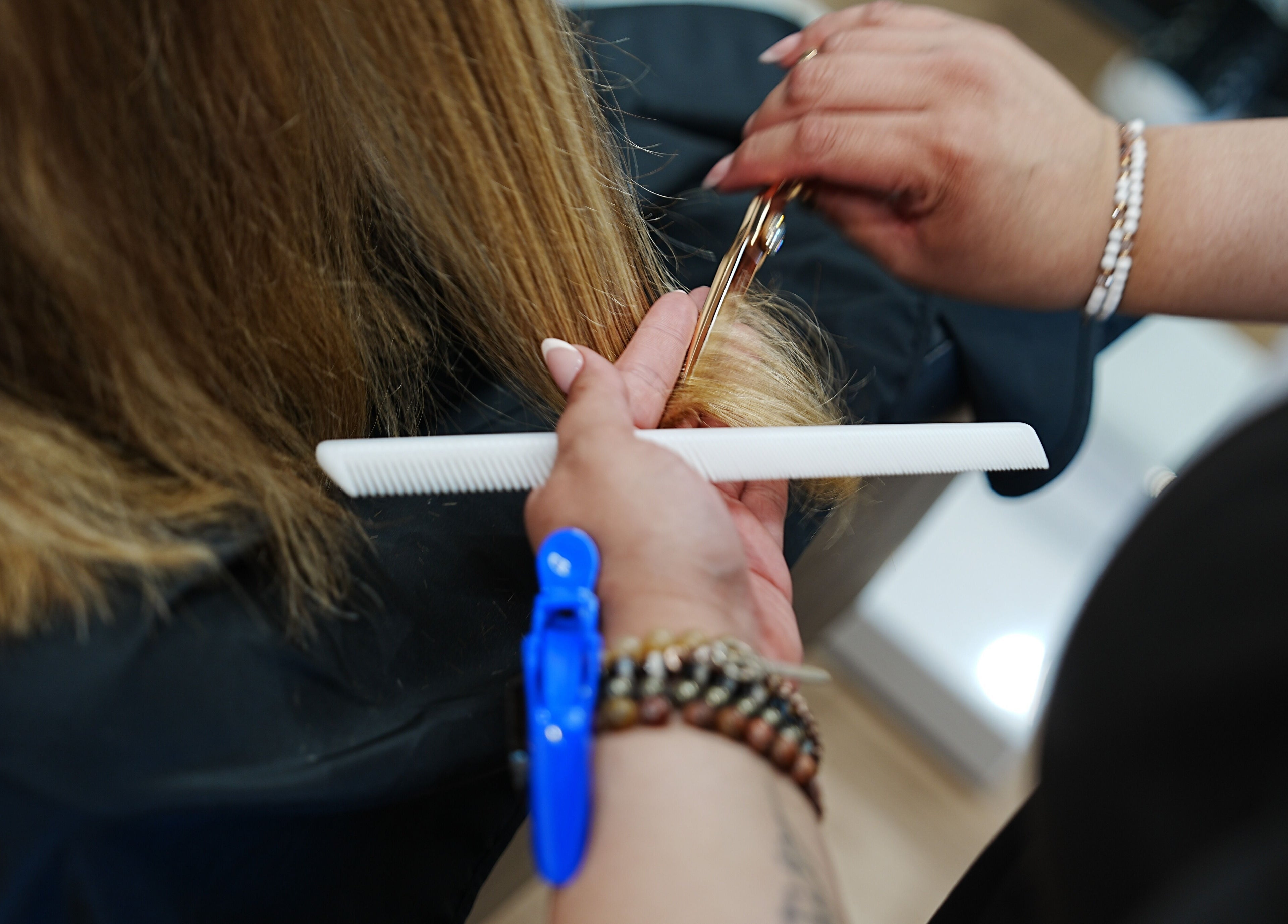 Professional haircut service at Artisan Theory Salon, Villa Park, Illinois, US.