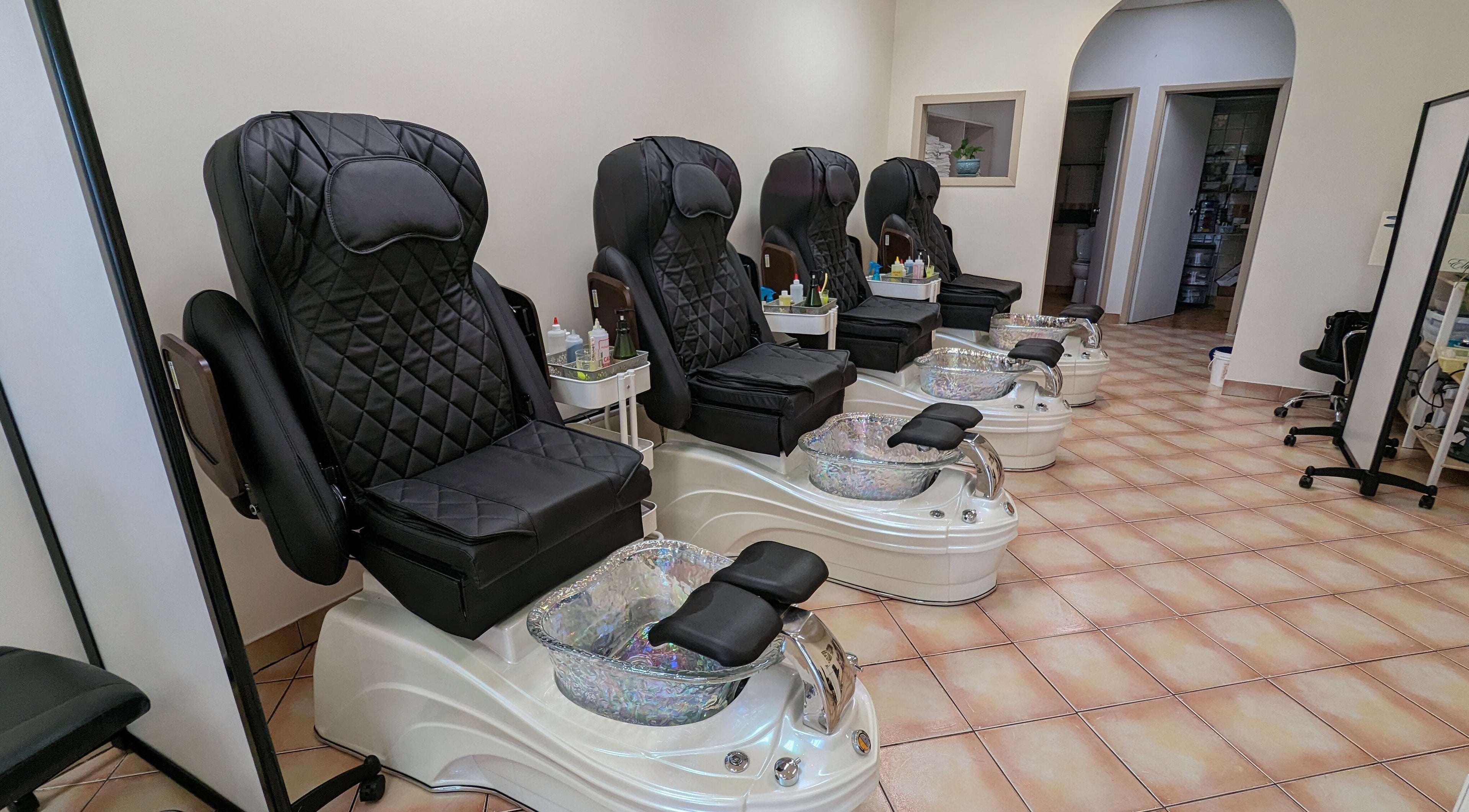 Elegant pedicure chairs at TJ Hanh Nails and Spa, Calgary, Alberta, CA, offering luxury spa services.