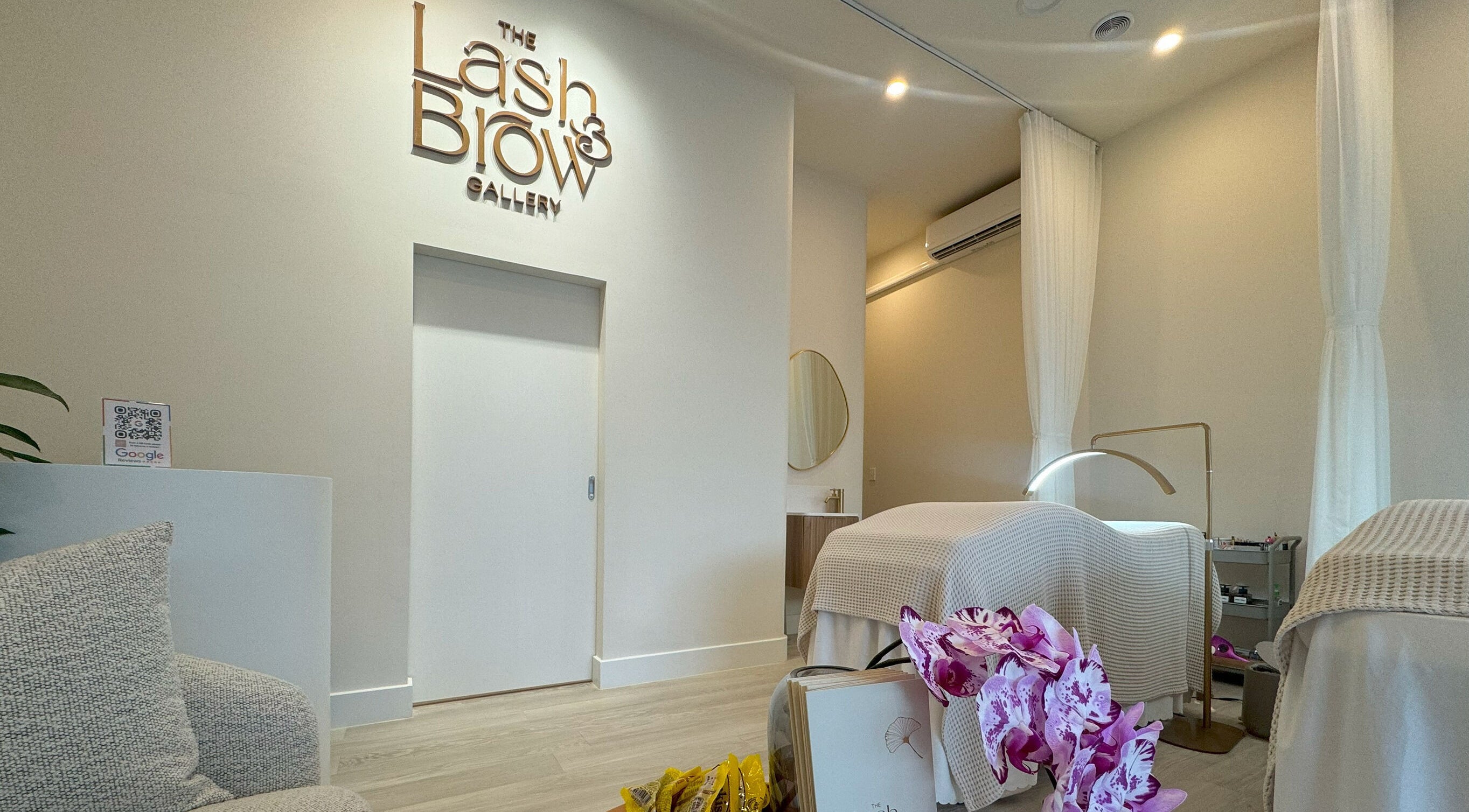 Elegant treatment room at The Lash And Brow Gallery Malvern, Melbourne, Victoria, AU with plush bed and decor.