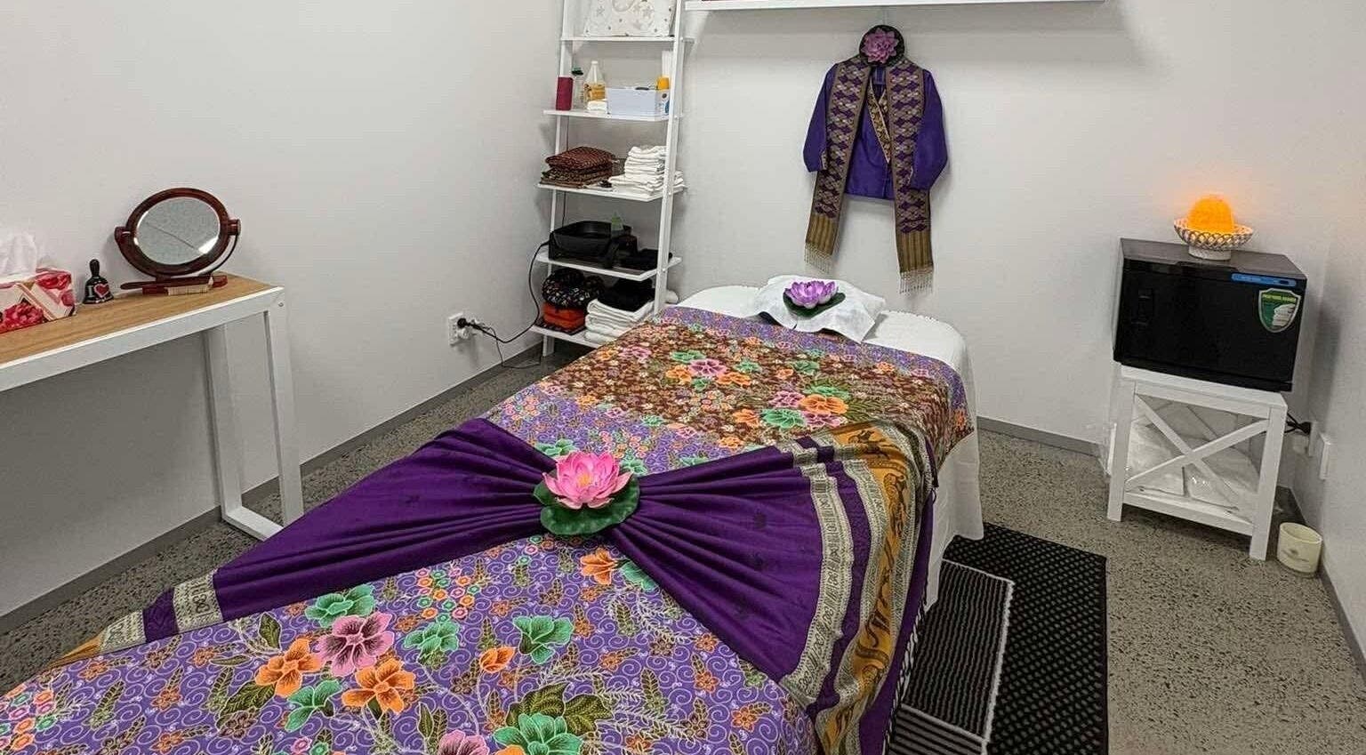 Colorful massage table setup at Nom's Original Thai Massage, Auckland, Auckland, NZ showcasing authentic decor.