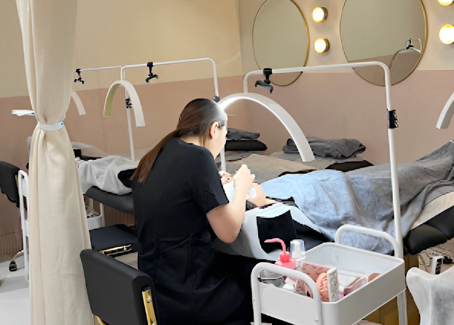 Milash Studio Merrylands beautician working on client in relaxing room, Merrylands, New South Wales, AU.