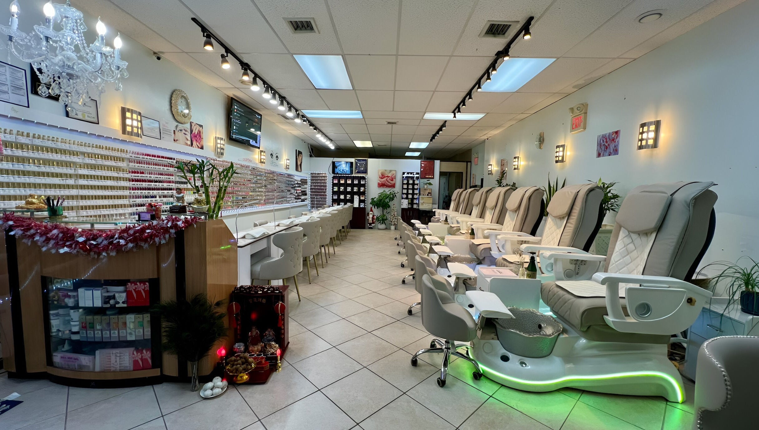 Elegant interior of Castle Nails and Spa Inc in Tewksbury, Massachusetts, US, showcasing stylish pedicure chairs.