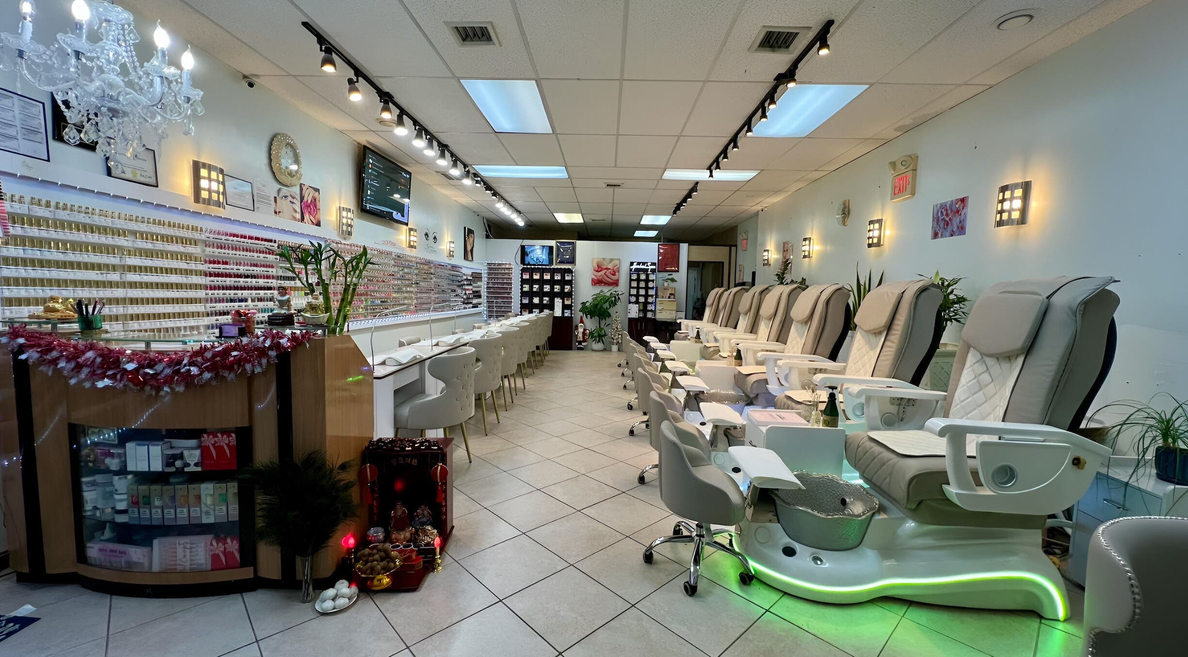 Elegant interior of Castle Nails and Spa Inc in Tewksbury, Massachusetts, US, showcasing stylish pedicure chairs.
