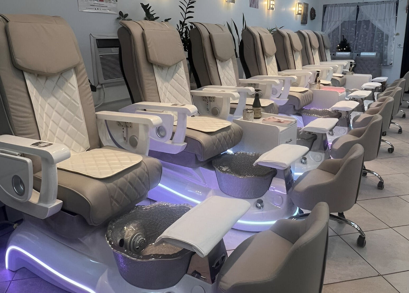 Elegant pedicure chairs at Castle Nails and Spa Inc, Tewksbury, Massachusetts, US, offering relaxing experiences.