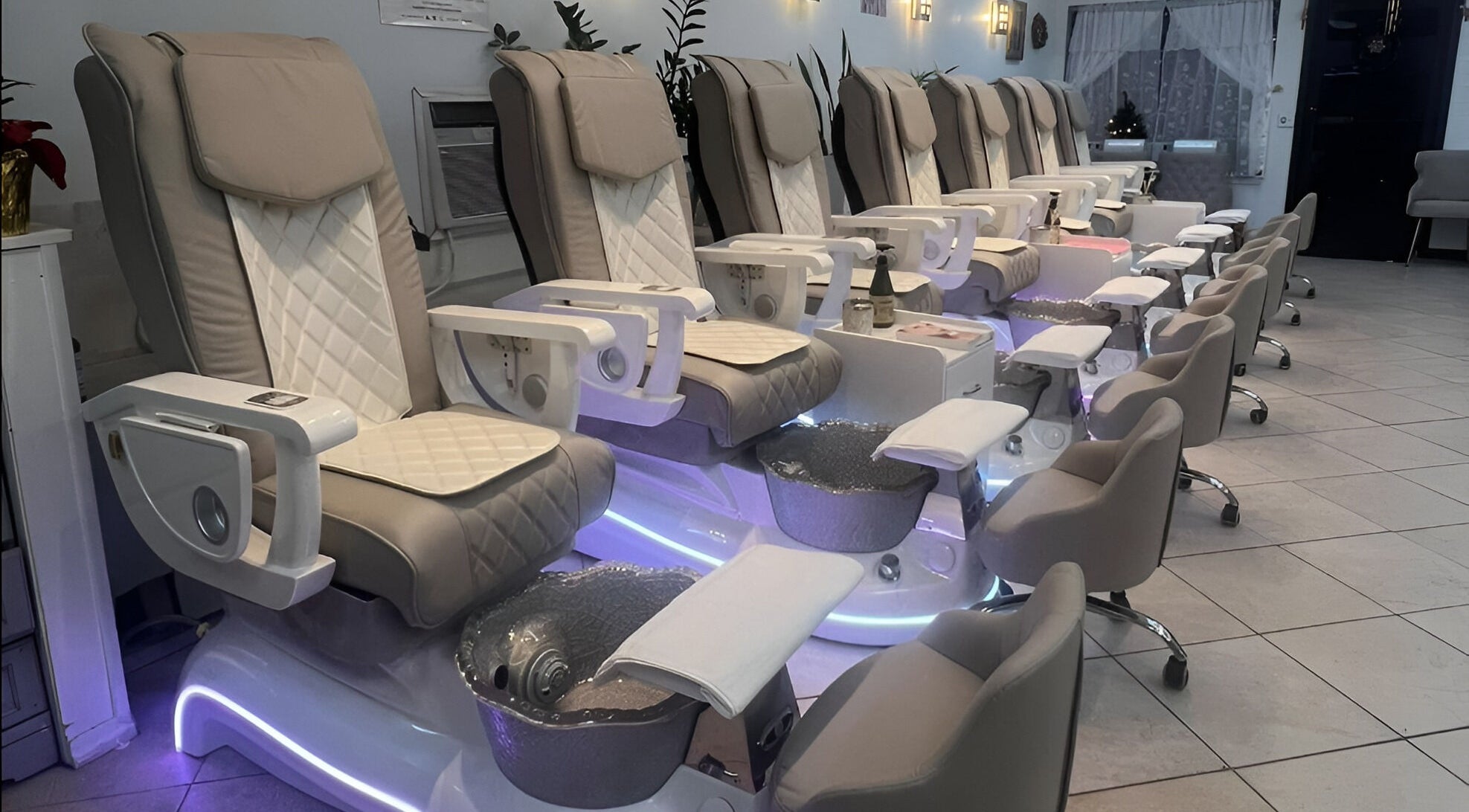 Elegant pedicure chairs at Castle Nails and Spa Inc, Tewksbury, Massachusetts, US, offering relaxing experiences.