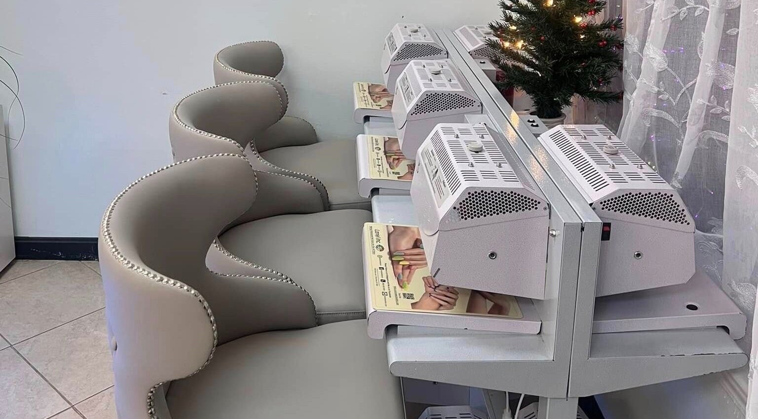 Stylish nail dryers and seating at Castle Nails and Spa Inc, Tewksbury, Massachusetts, US.