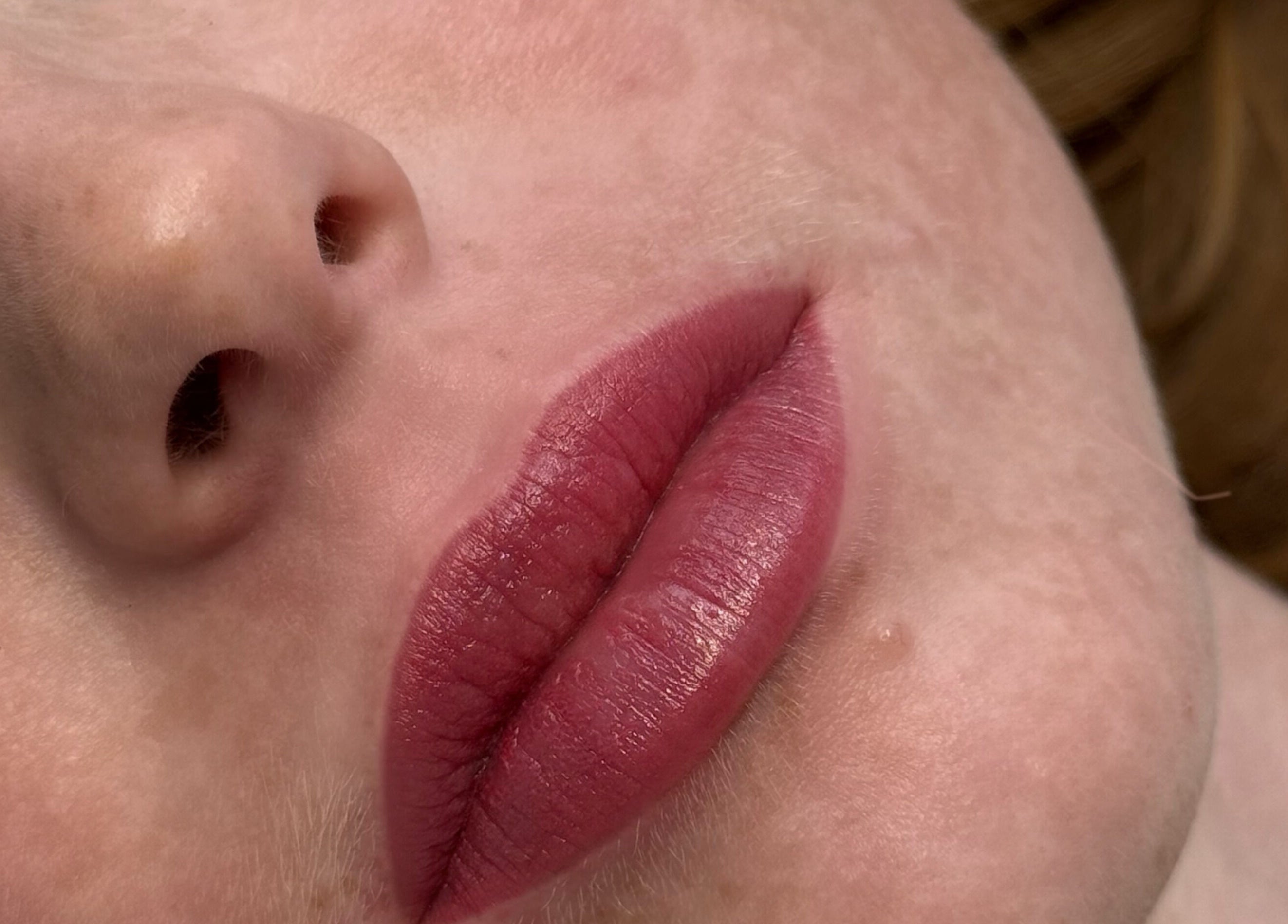 Close-up of vibrant lips enhanced by Defined Cosmetics at Labrador, Queensland, AU.