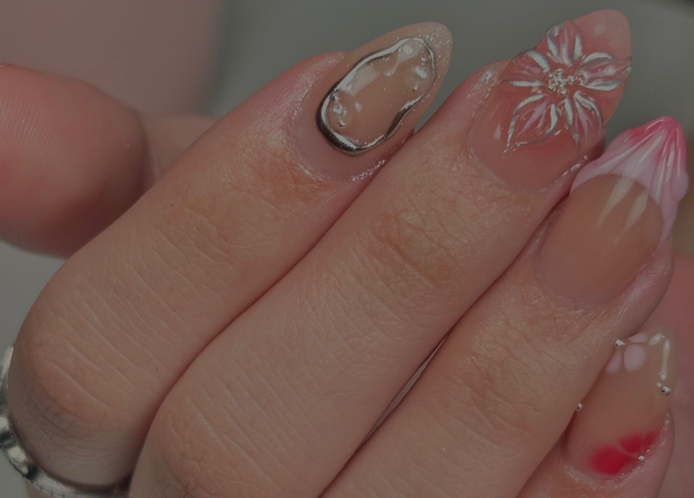 Intricate nail art with flowers at Nanesdivinedit in Flagstone, Queensland, AU, showcasing detailed artistry.