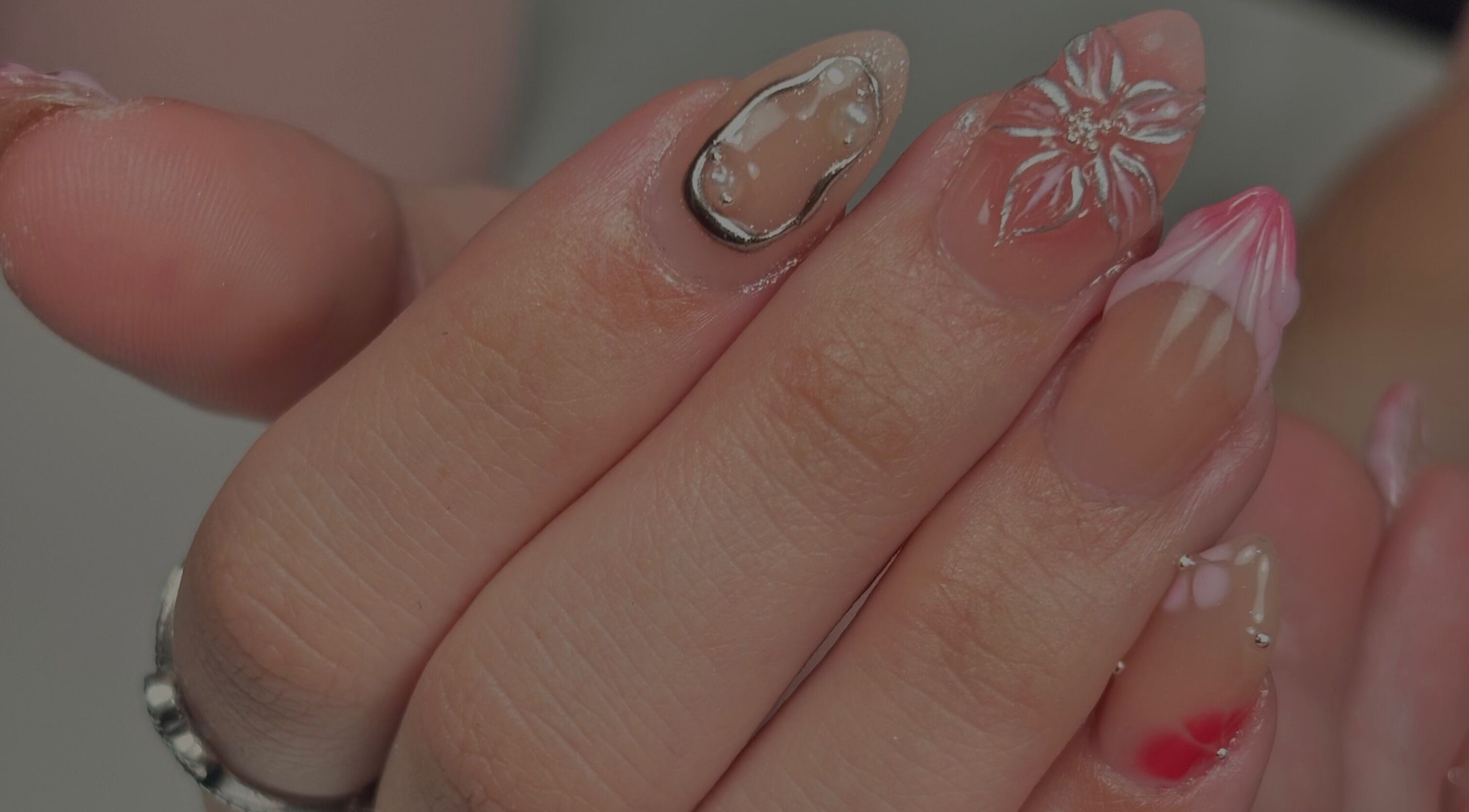 Intricate nail art with flowers at Nanesdivinedit in Flagstone, Queensland, AU, showcasing detailed artistry.