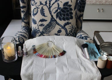 Manicure setup with polish and tools at I.T Nails - Home Service in Riyadh, Riyadh Province, SA.