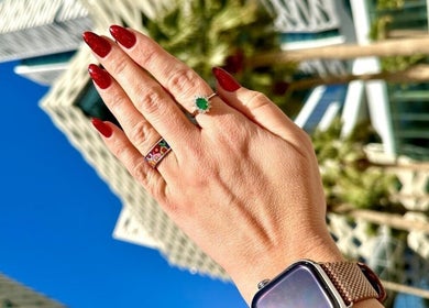 Stunning red manicure by I.T Nails - Home Service in Riyadh, Riyadh Province, SA, with eye-catching rings.