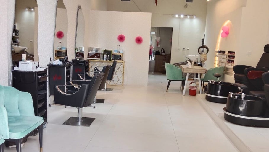 Interior of Streaks ladies Salon - Meydan, a calming beauty space in Dubai, Dubai, AE with modern styling stations.
