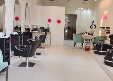 Interior of Streaks ladies Salon - Meydan, a calming beauty space in Dubai, Dubai, AE with modern styling stations.