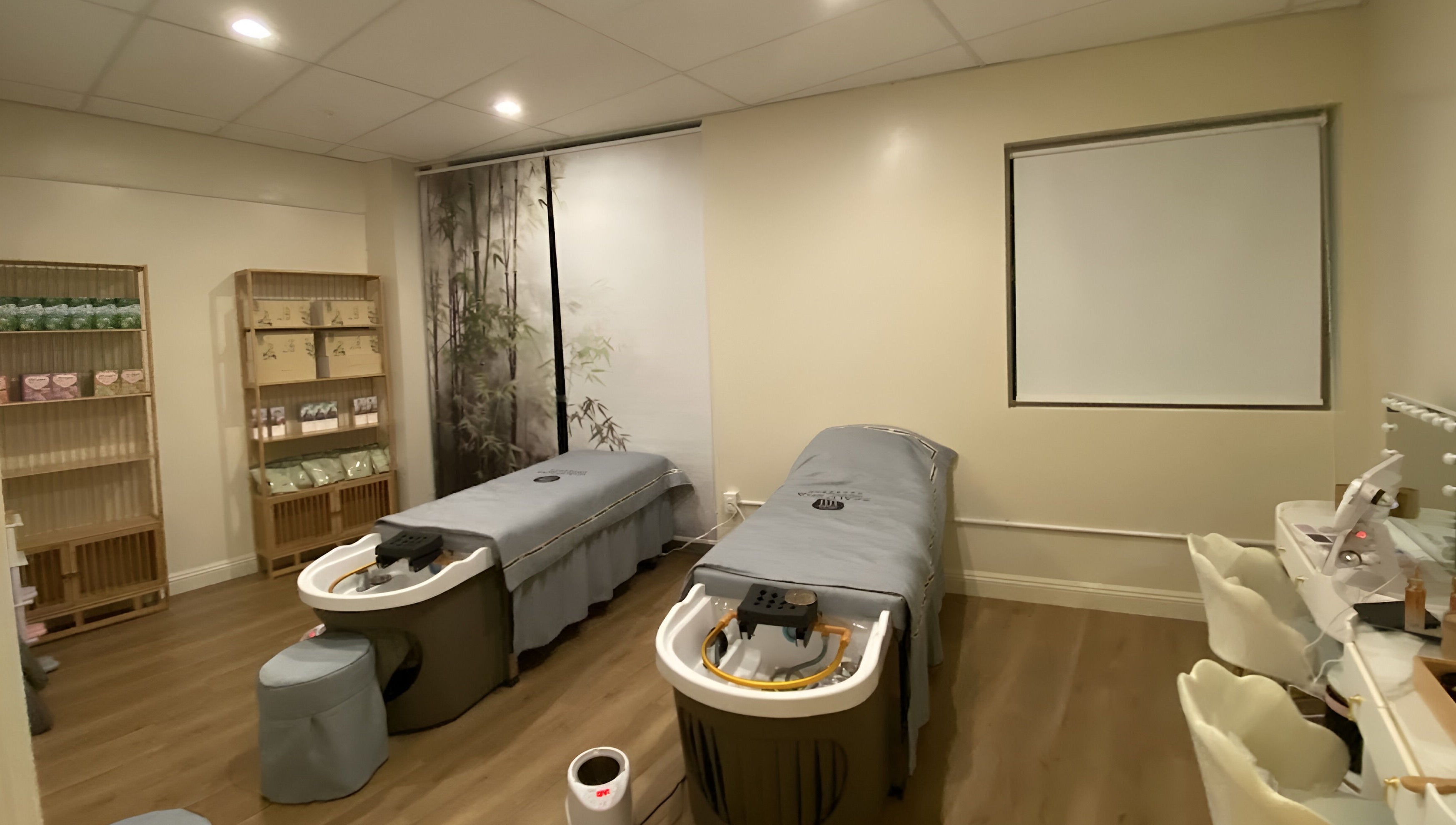 Tranquil spa room with two massage beds at YU HEAD SPA & WELLNESS CENTER in Sandy, Utah, US.