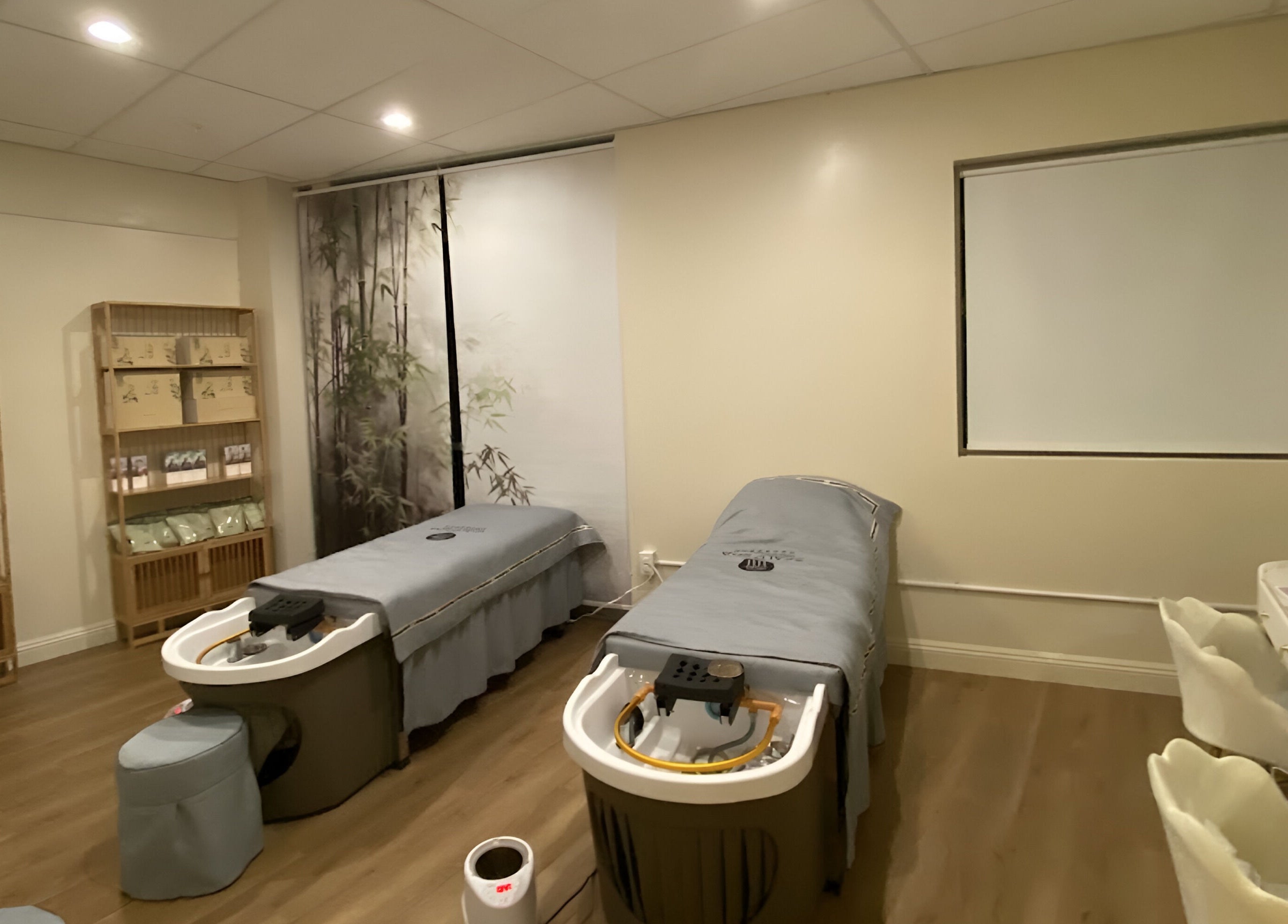 Tranquil spa room with two massage beds at YU HEAD SPA & WELLNESS CENTER in Sandy, Utah, US.
