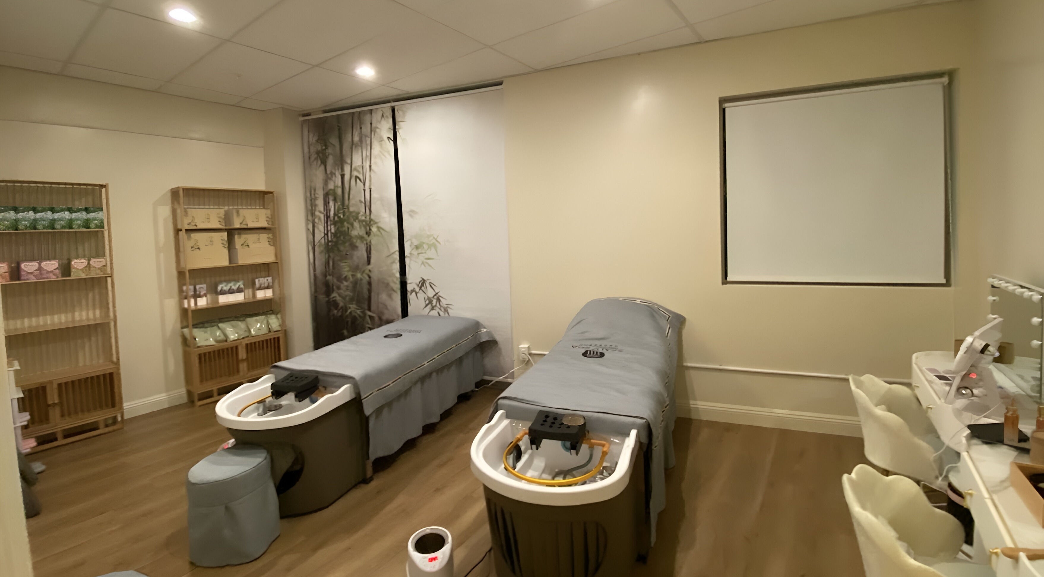 Tranquil spa room with two massage beds at YU HEAD SPA & WELLNESS CENTER in Sandy, Utah, US.