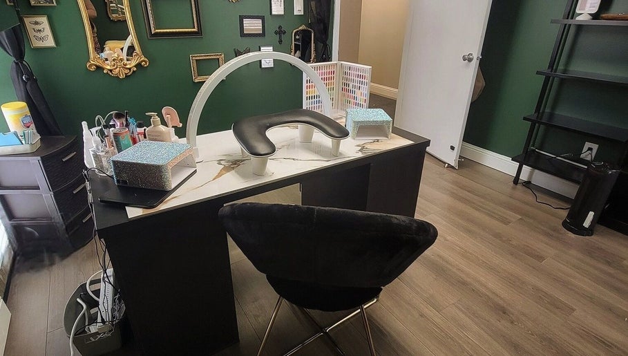 Elegant manicure station at Everyday Elegance Spa, West Jordan, Utah. Modern design with black chair and nail tools.