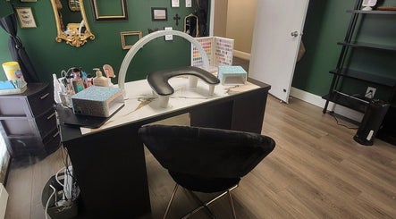 Elegant manicure station at Everyday Elegance Spa, West Jordan, Utah. Modern design with black chair and nail tools.