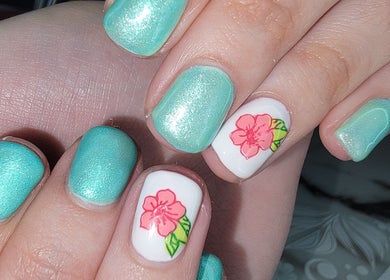 Aqua and floral nail art at Everyday Elegance Spa in West Jordan, Utah, US enhances beauty and style.