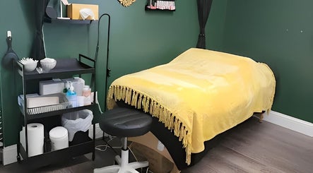 Treatment room with yellow blanket at Everyday Elegance Spa, West Jordan, Utah, US.