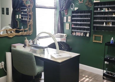 Nail care station at Everyday Elegance Spa, West Jordan, Utah, US, showcasing chic decor and nail polish selection.