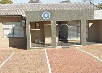 Entrance of Serenity Wellness & Beauty Spa in Gqeberha, Eastern Cape, ZA, showcasing a welcoming exterior.