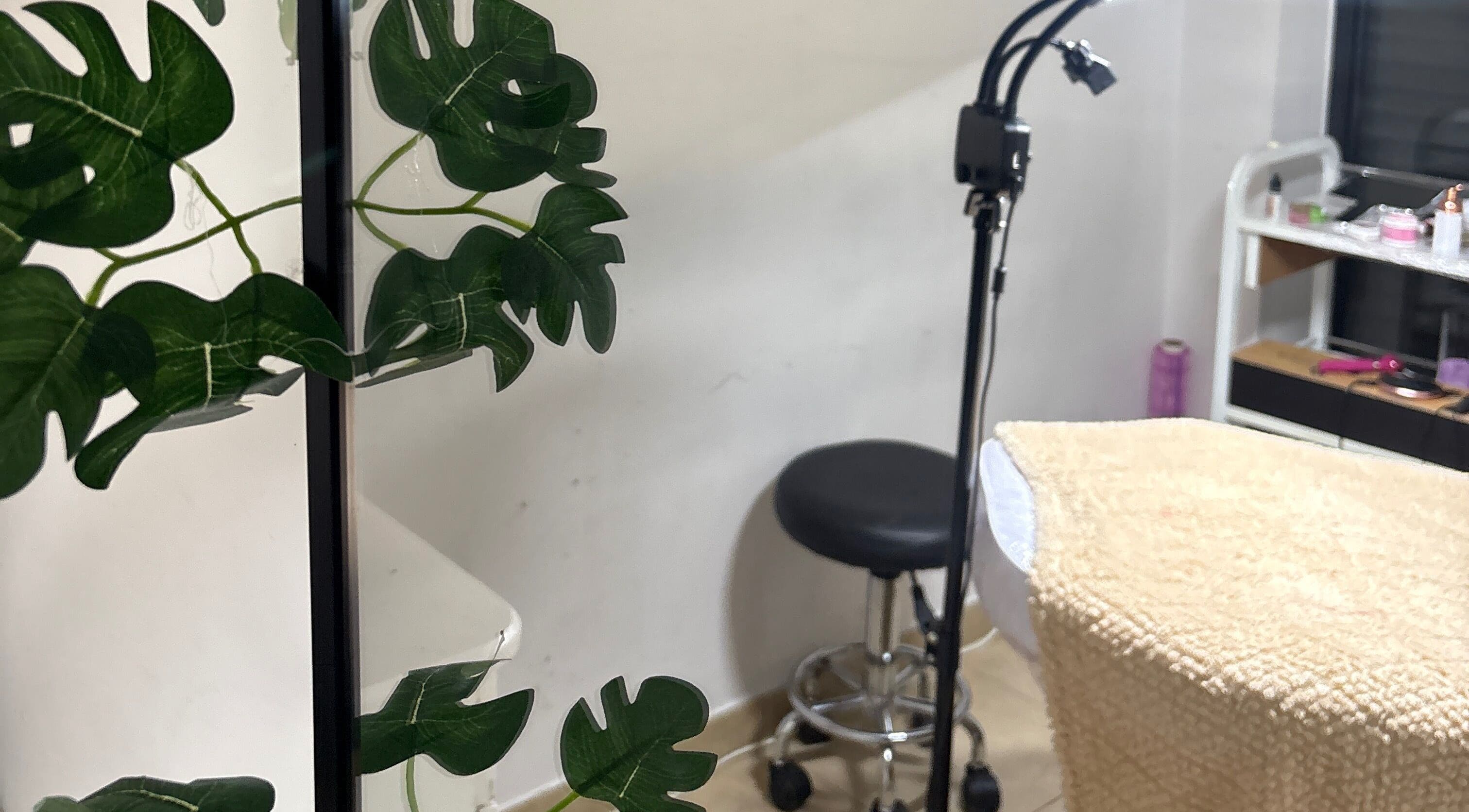 Espaço de tratamento acolhedor no Studio Maria Nascimento, Anderlecht, Bruxelles, BE, com decoração suave.