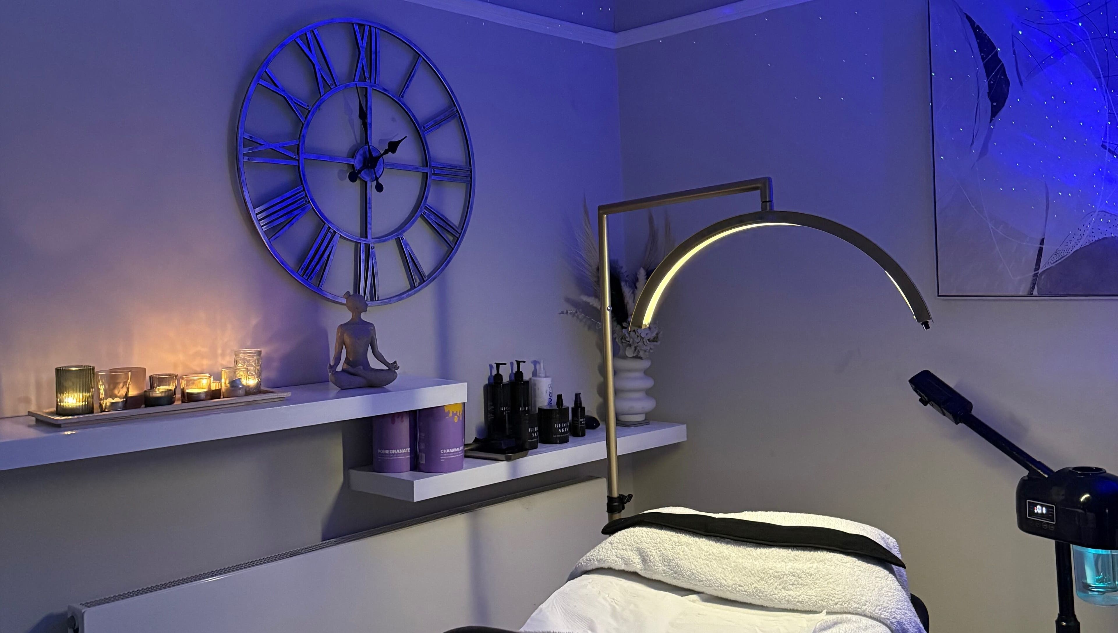 Relaxing spa room at Touch Of Shannon, Workington, England, GB with candles and serene decor.