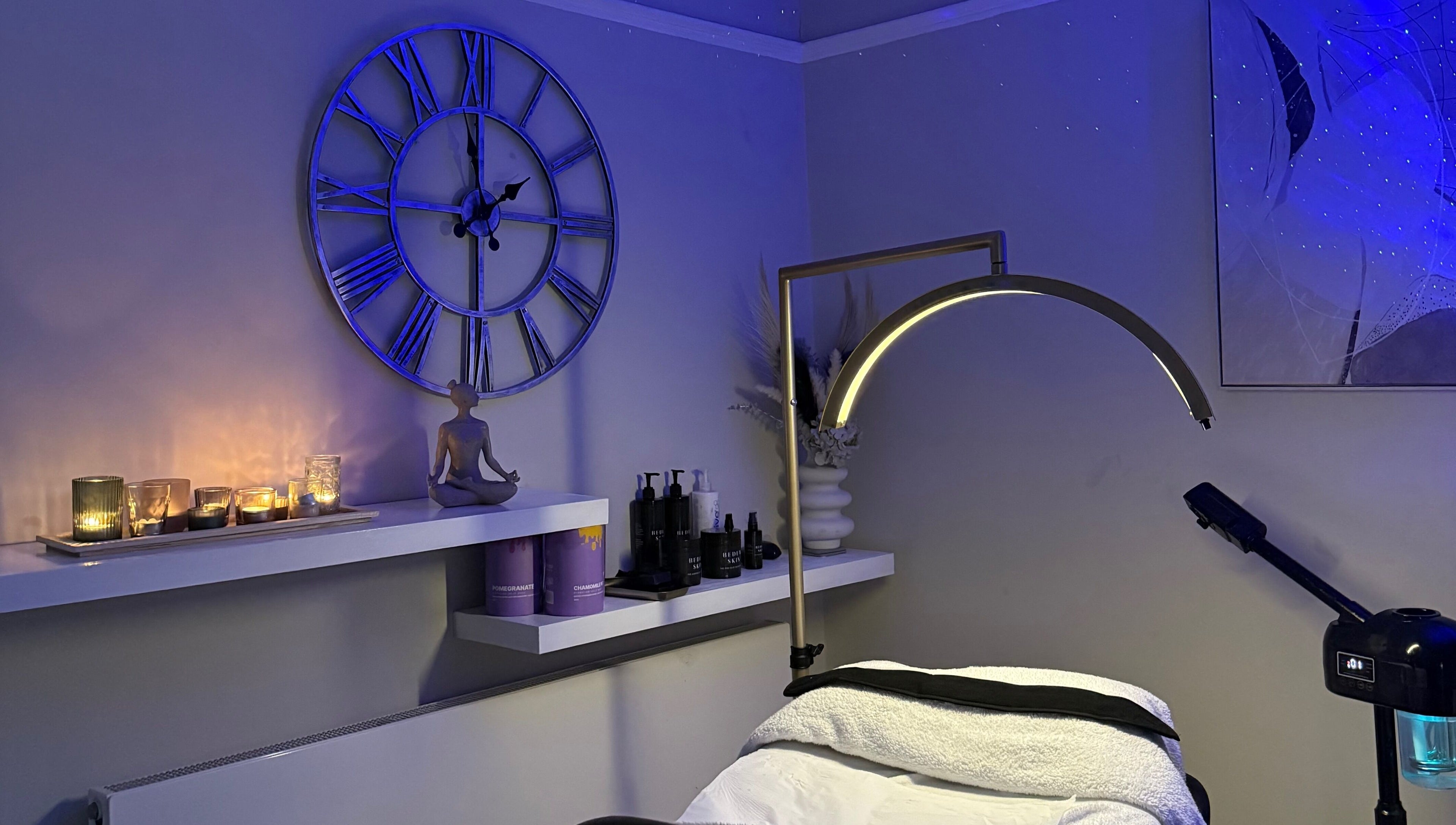 Relaxing spa room at Touch Of Shannon, Workington, England, GB with candles and serene decor.