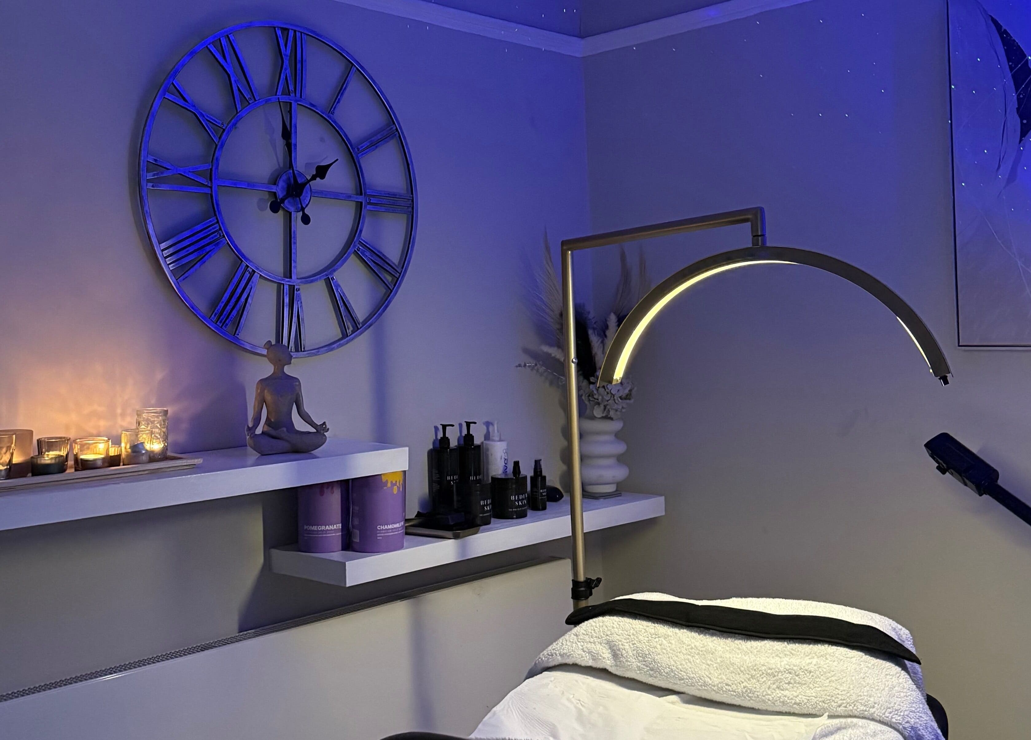 Relaxing spa room at Touch Of Shannon, Workington, England, GB with candles and serene decor.