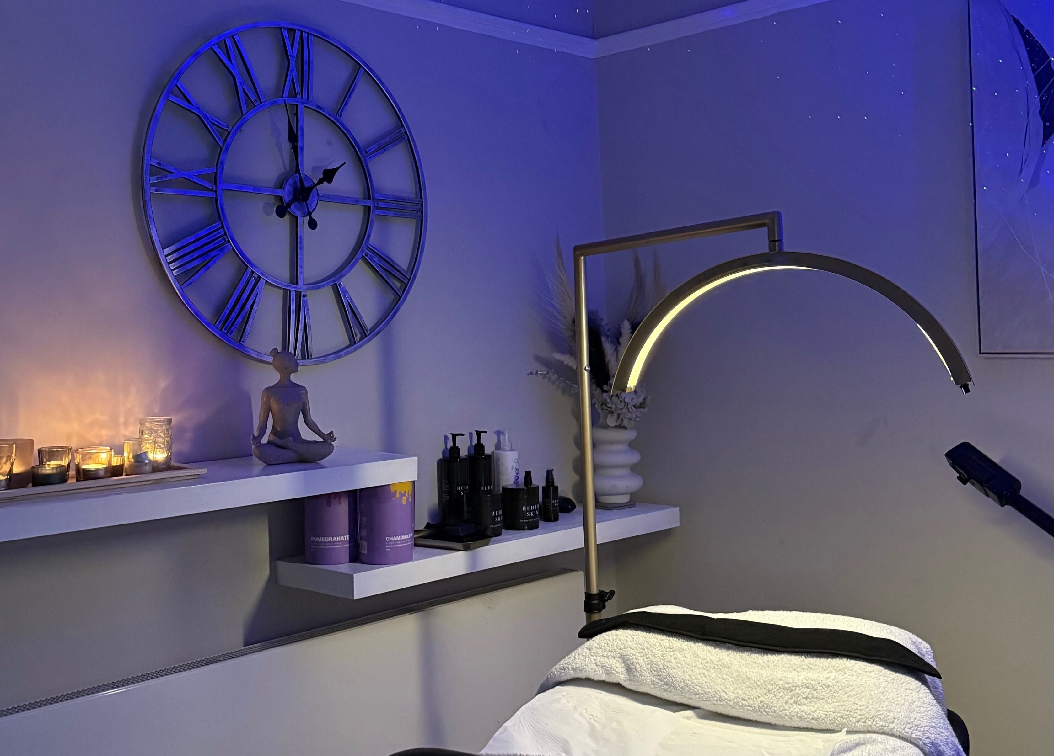 Relaxing spa room at Touch Of Shannon, Workington, England, GB with candles and serene decor.