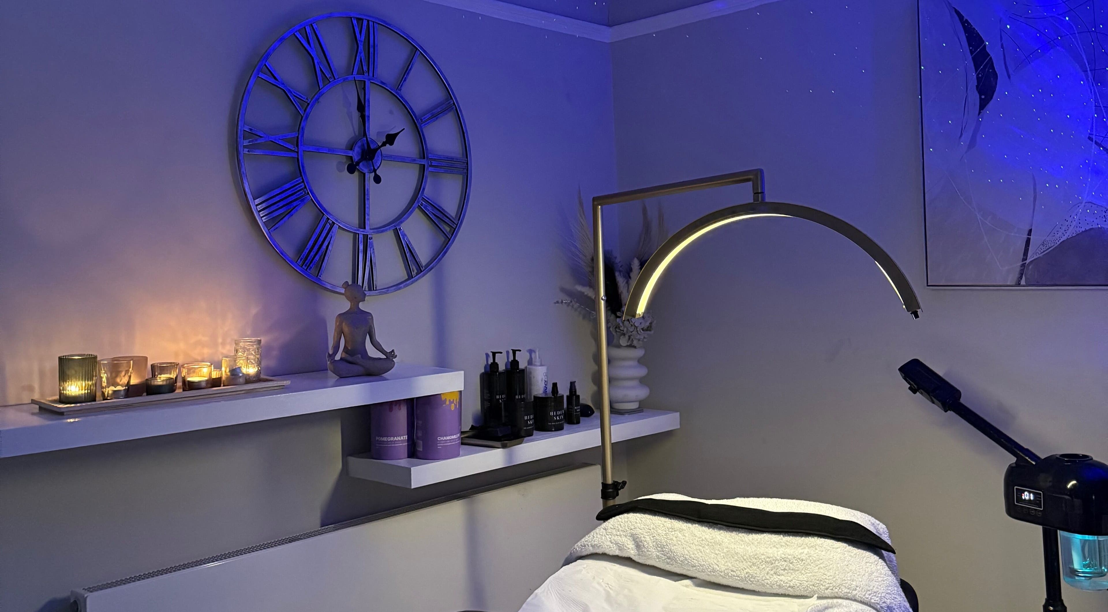 Relaxing spa room at Touch Of Shannon, Workington, England, GB with candles and serene decor.
