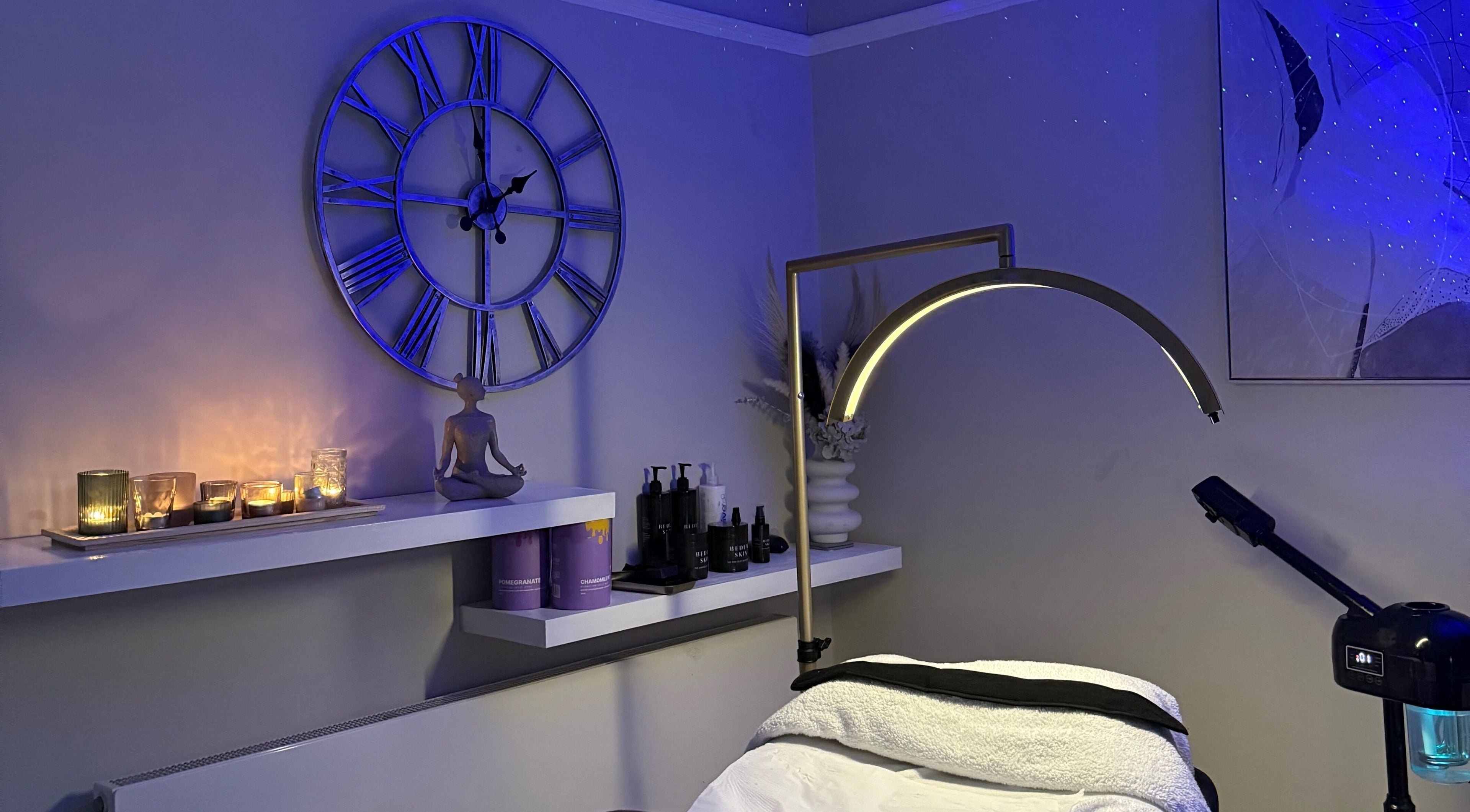 Relaxing spa room at Touch Of Shannon, Workington, England, GB with candles and serene decor.
