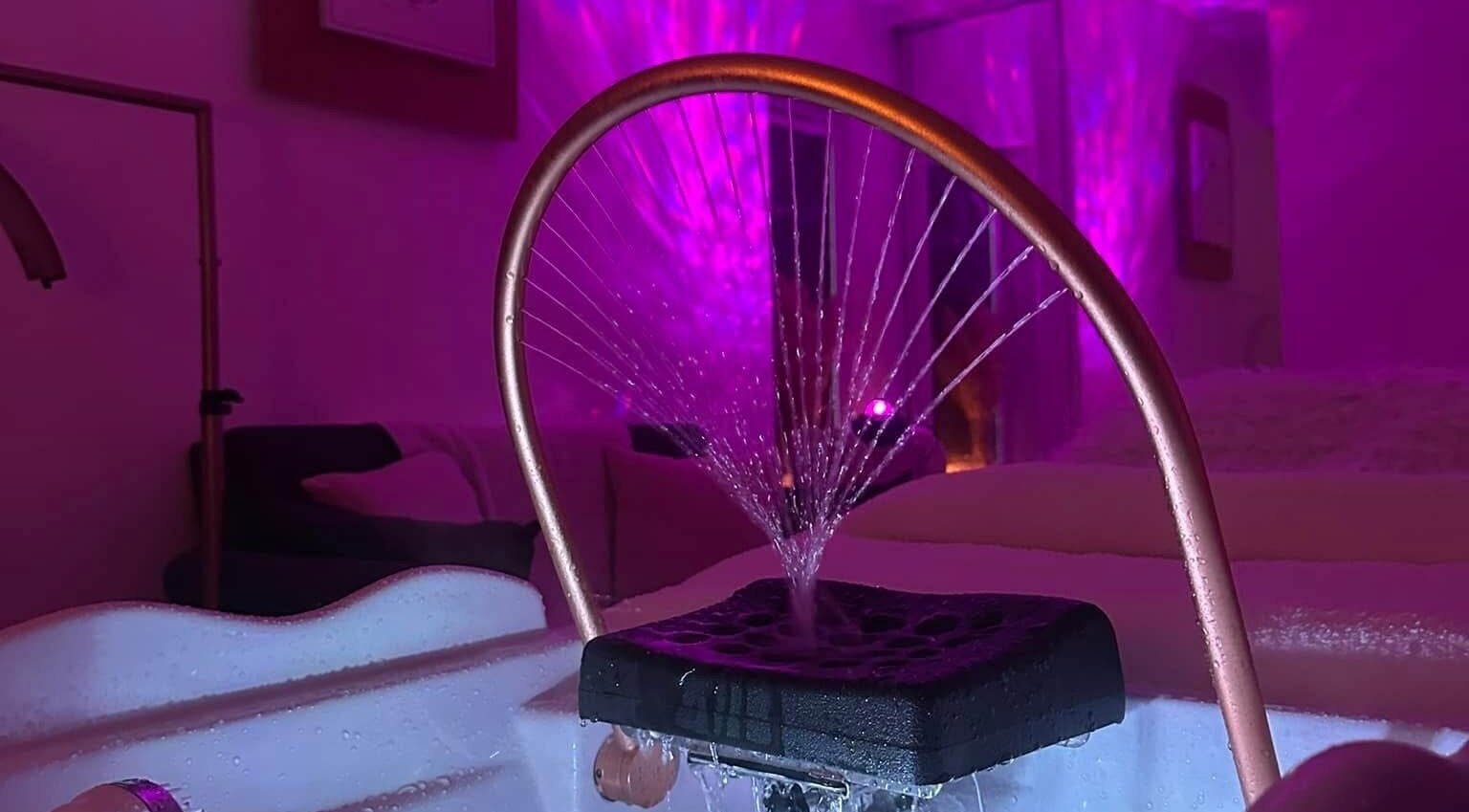 Atmospheric spa room with water feature at Touch Of Shannon, Workington, England, GB.