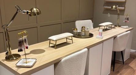 Chic nail station at Biabs By Abs, Llansamlet, Wales, GB with plush seating and gold accents.