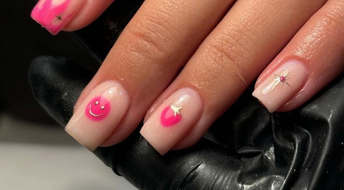 Stylish pink smiley nail art at Biabs By Abs in Llansamlet, Wales, GB. A blend of fun and elegance.