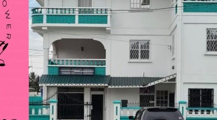 Front view of Sam’s Creation, Georgetown, Demerara-mahaica, GY showcasing stylish architecture.