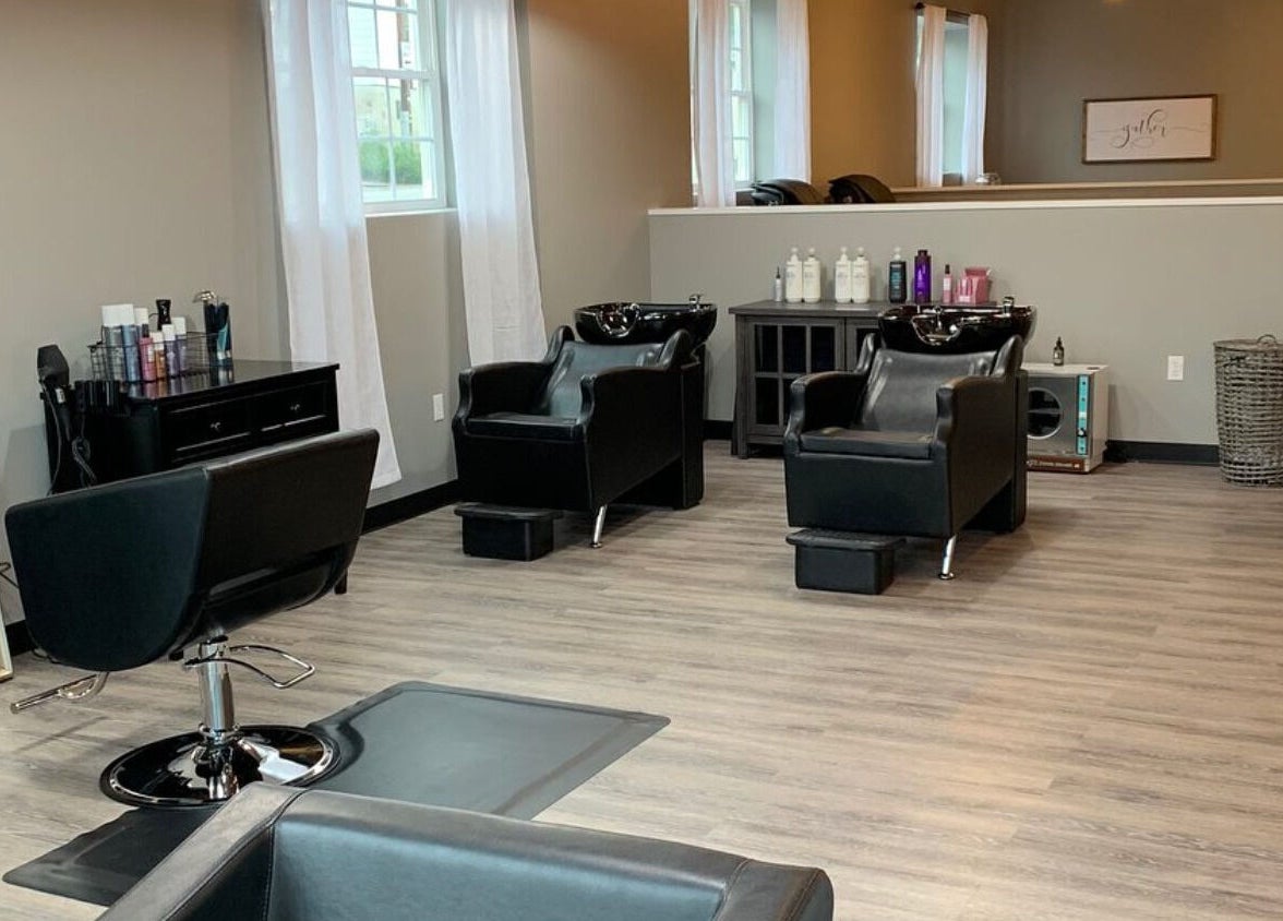 Elegant styling chairs at Stella Salon and Spa in Taylor, Pennsylvania, US, showcasing modern decor and comfort.