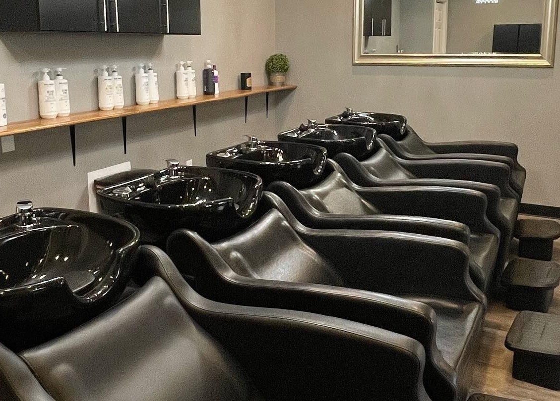 Modern wash stations at Stella Salon and Spa in Taylor, Pennsylvania, US, offering luxury hair care experiences.