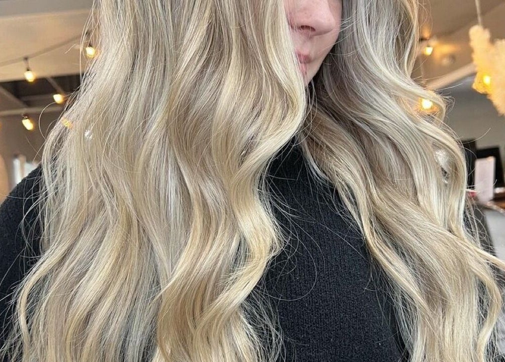 Blonde hair styled in waves at Stella Salon and Spa in Taylor, Pennsylvania, US.