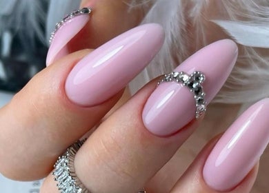 Beautiful pink manicured nails with rhinestone detail at Moscow Beauty, Riyadh, Riyadh, SA.