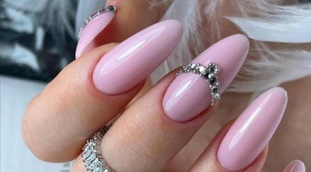Beautiful pink manicured nails with rhinestone detail at Moscow Beauty, Riyadh, Riyadh, SA.
