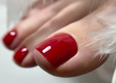 Close-up of a polished red toenail at Moscow Beauty, Riyadh , Riyadh , SA.