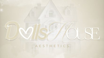 Elegant logo of Doll’s House Aesthetics in Cwmbran, Wales, GB, set against a soft, dreamy backdrop.