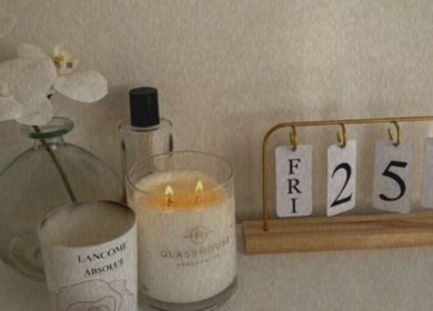 Calming candle and elegant decor at House Of Brows, New Plymouth, Taranaki, NZ enhancing a serene ambiance.