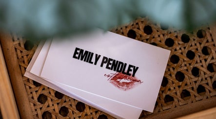 Emily Pendley - Esthetician business card on woven surface in West Baden Springs, Indiana, US.