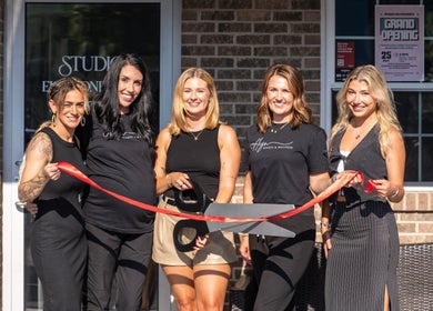 Emily Pendley - Esthetician team at grand opening in West Baden Springs, Indiana, US, cutting a red ribbon.