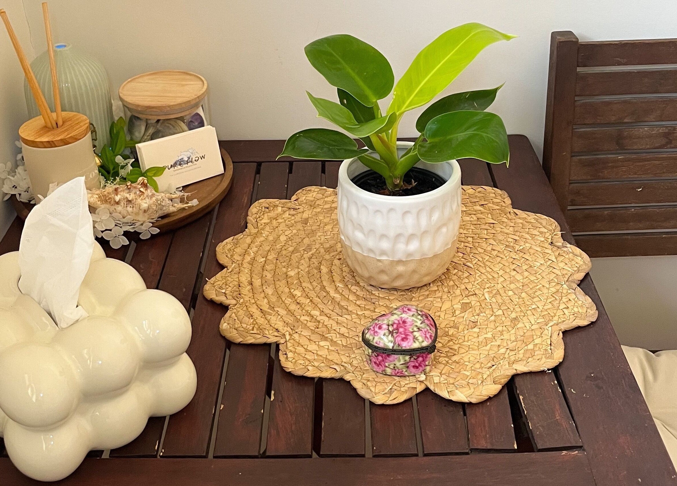 Relaxing corner at Pure Flow Massage, Bankstown, New South Wales, AU. Features a plant and soothing decor.
